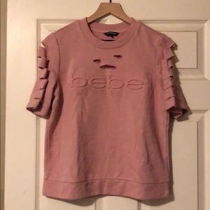 Distressed Bebe Sport sweater/sweatshirt
